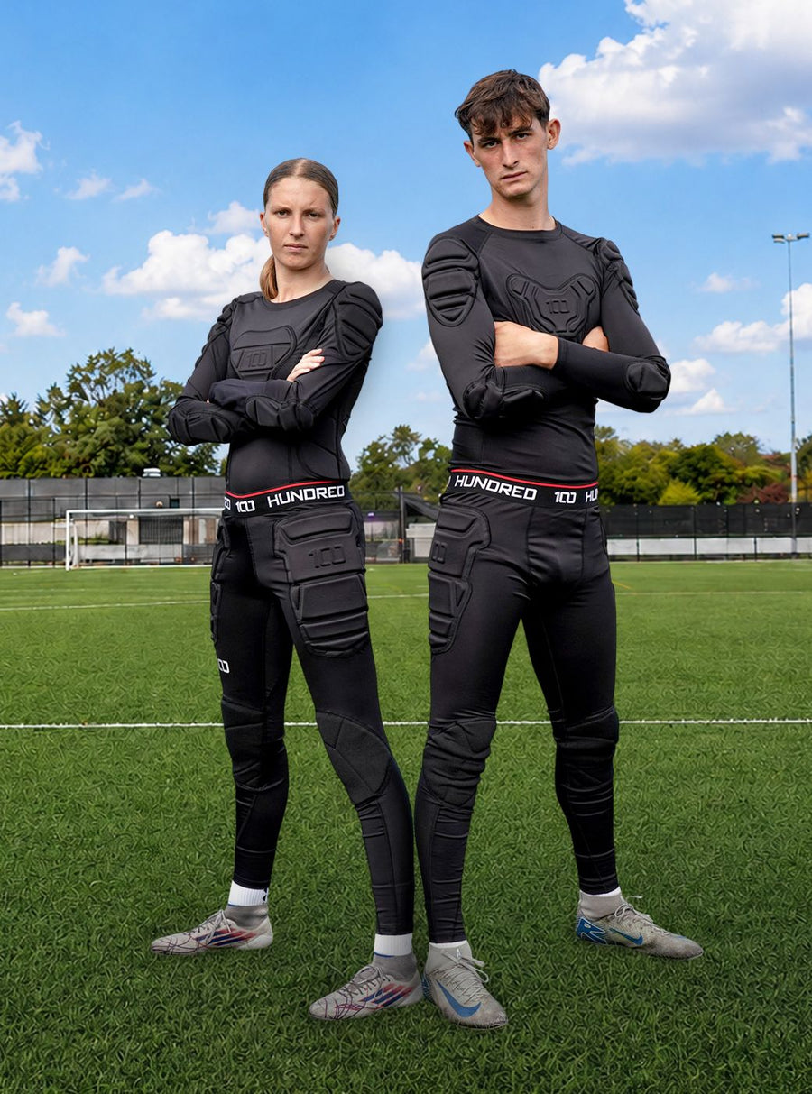 Two goalkeepers wearing Hundred Protekt padded tops and trousers on a training pitch